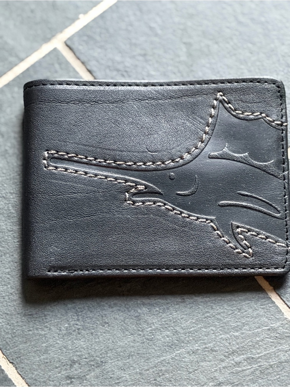 Tommy Bahama Black Leather Bifold Wallet with Marlin Stitch Detail